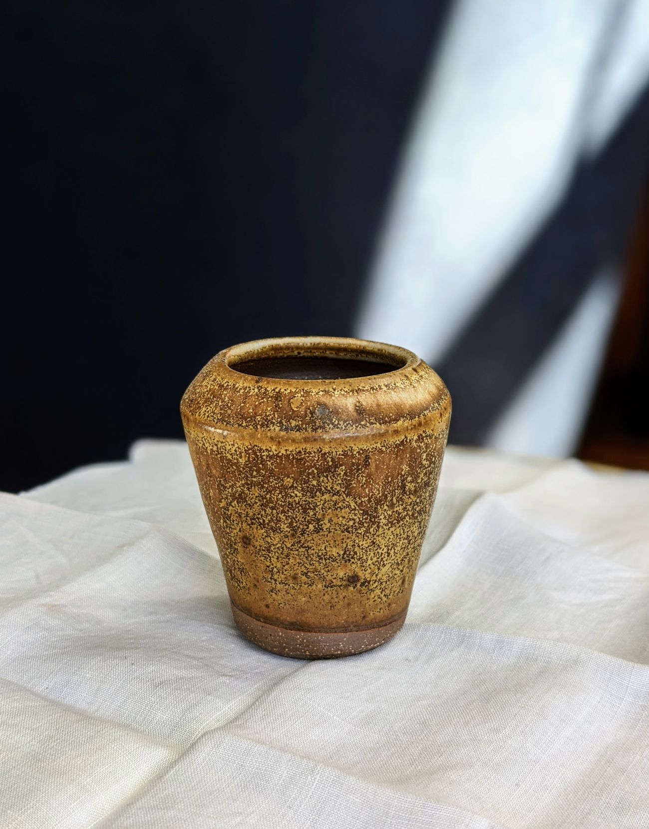 Tiny brown vase